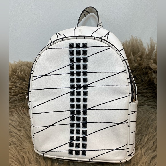 L.A.M.B. Handbags - L.A.M.B. Small Leather backpack, white with black lines.